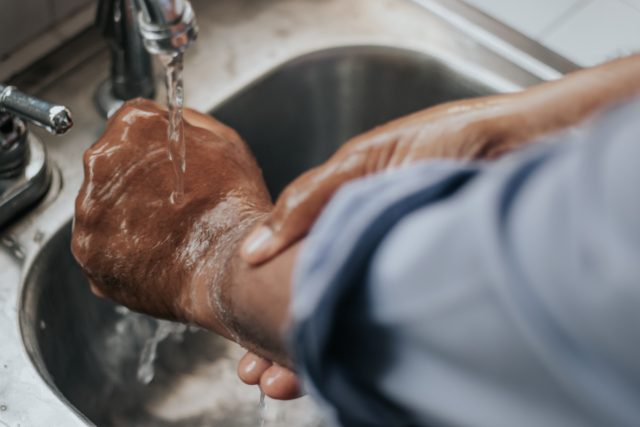 man-washing-hands